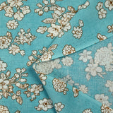 Viscosa estampada primavera blanco roto con fondo azul azurin