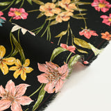 Viscose imprimée fleurs sauvages roses jaunes et orange fond noir