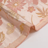 Brocart lamé éclat de fleurs doré et rose dragée