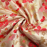 Brocart lamé éclat de fleurs doré et rouge coquelicot