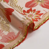 Brocart lamé éclat de fleurs doré et rouge coquelicot