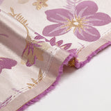 Brocart lamé éclat de fleurs doré et mauve