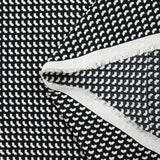 Crepé de viscosa con estampado gráfico negro sobre fondo crudo