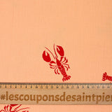 Double gauze printed with red lobster and apricot background