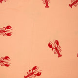 Double gauze printed with red lobster and apricot background