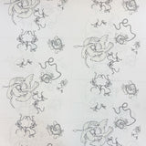 Popelina de algodón estampada con palomas y lazo blanco.