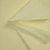 Coton satiné fin rayure ton sur ton jaune pâle