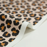 Tissu imperméable déperlant imprimé tacheté marron fond beige