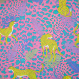 Coton imprimé léopard jaune fond jungle rose