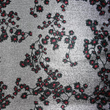 Flor de Sakura roja y negra de Lamé Silver Jersey estampada