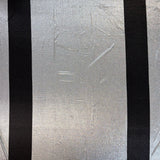Jersey lamé argent rayure noire