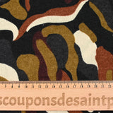 Brown and ecru wave printed knitted knit with black background