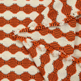 Maille polyester fantaisie écru et orange