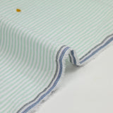 Dyed woven cotton embroidered daisy white and green striped background