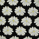 Cotton jersey printed marguerite sponge in relief black background