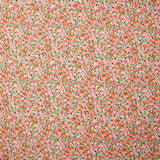 Polyester imprimé fleur rose et orange fond écru