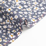 Viscose imprimée fleurs blanches et jaunes fond gris anthracite