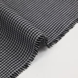 Coton tissé teint carreaux noir et blanc fond gris