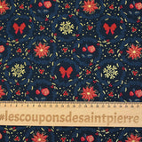 Popelina de algodón estampada con flores de pascua y lazos rojos sobre fondo azul marino