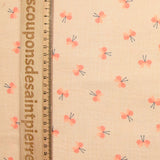 Double gauze printed butterfly on bisque background