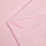 Coton imprimé pois 1mm fond rose clair