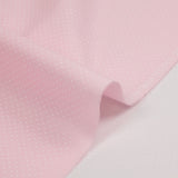Coton imprimé pois 1mm fond rose clair