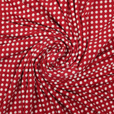Jersey de polyester floqué et imprimé pois blanc fond rouge