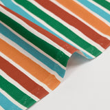 Cotton poplin printed with orange, green and turquoise deckchair stripes