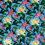 Maille velours imprimé botanique fond bleu turquoise
