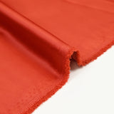 Satin de polyester Lucie corail foncé
