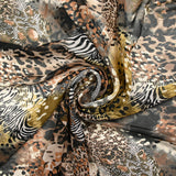 Mousseline imprimée esprit savane fond marron