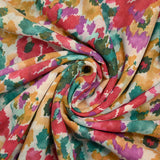 Turquoise, red and orange polycoton sail printed.