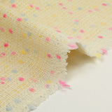 Wool blend tweed pink and blue confetti yellow background
