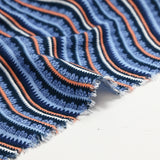 Gasa doble estampada onda y pluma azul naranja