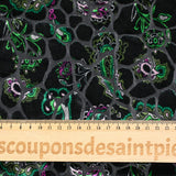 Punto animal devoré de terciopelo con estampado paisley verde y fondo negro