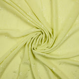 Voile de polyester brodé fleurs et feuillages vert anis