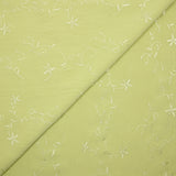 Voile de polyester brodé fleurs et feuillages vert anis