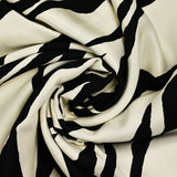 Viscose twill with black zebra print, ivory background