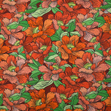 Coton imprimé constellation florale orange