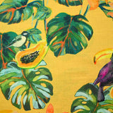 Coton imprimé monstera et papaye fond moutarde