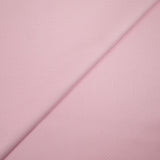 Coton imprimé pois 1mm fond rose clair