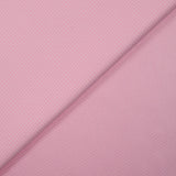 Coton imprimé pois 1mm fond rose layette