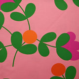 Coton imprimé texturé fleurs graphiques fond rose