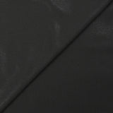 Crêpe de polyester fin pailletée ton sur ton fond noir