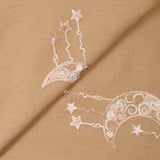 Crêpe viscose brodé Luna fond beige