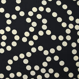 Crêpe viscose imprimé à pois ivoire fond bleu nuit