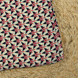 Crêpe viscose imprimé graphique rouge fond blanc cassé
