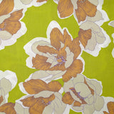 Crépon de viscose imprimé pivoine élégante fond vert anis