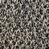 Dentelle imprimée instinct animal léopard fond beige