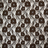 Dentelle polyester Martha métallisé argent fond marron